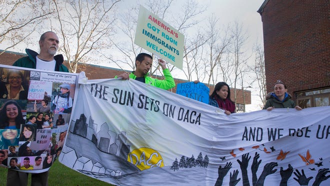 DACA Demonstrators carried banners and signs outside of Rep Tom MacArthur's office in Toms River in hopes of gaining his support for the Dream Act of 2017 that would provide a path to citizenship for dreamers. 